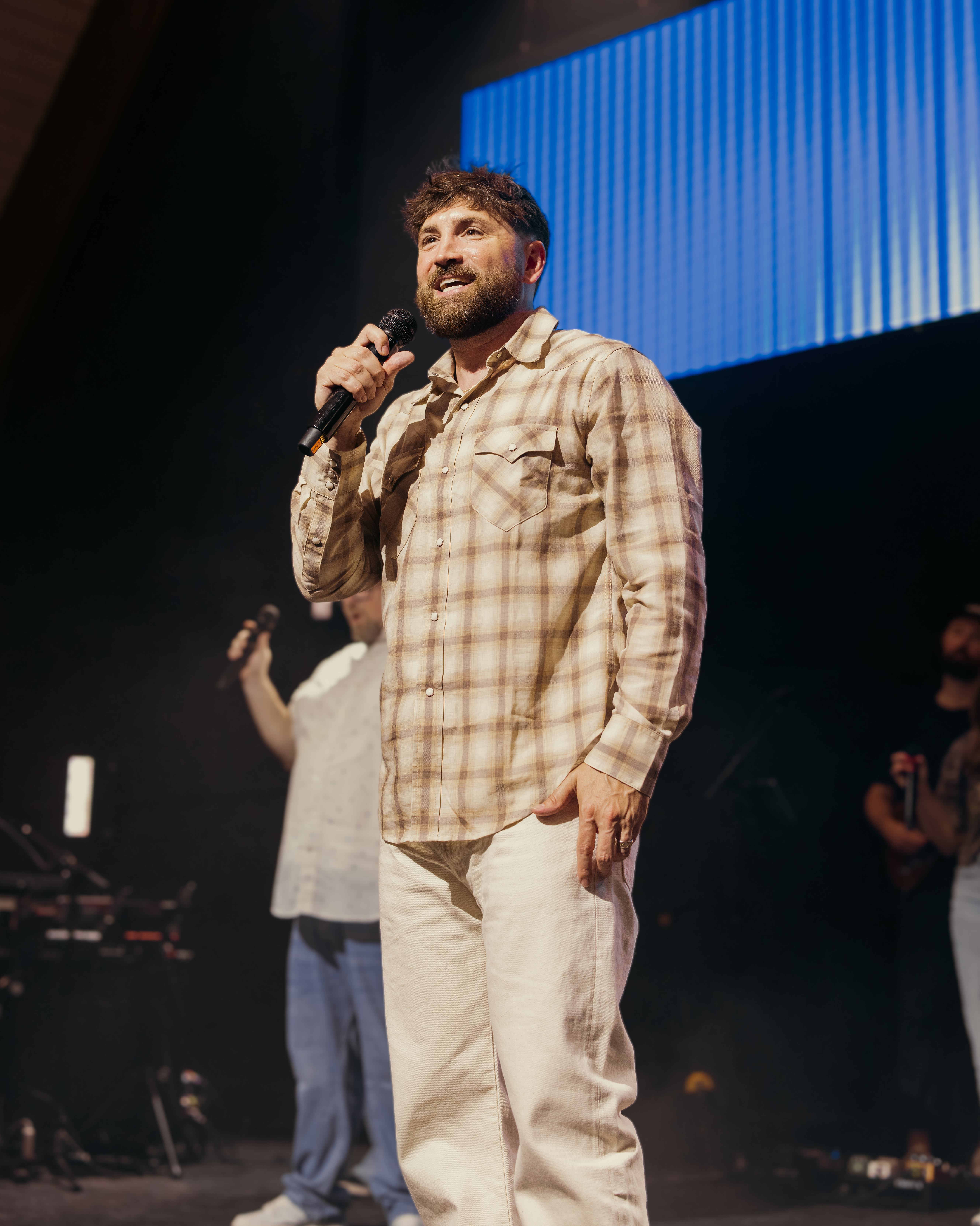 Lyle Phillips speaking into a microphone