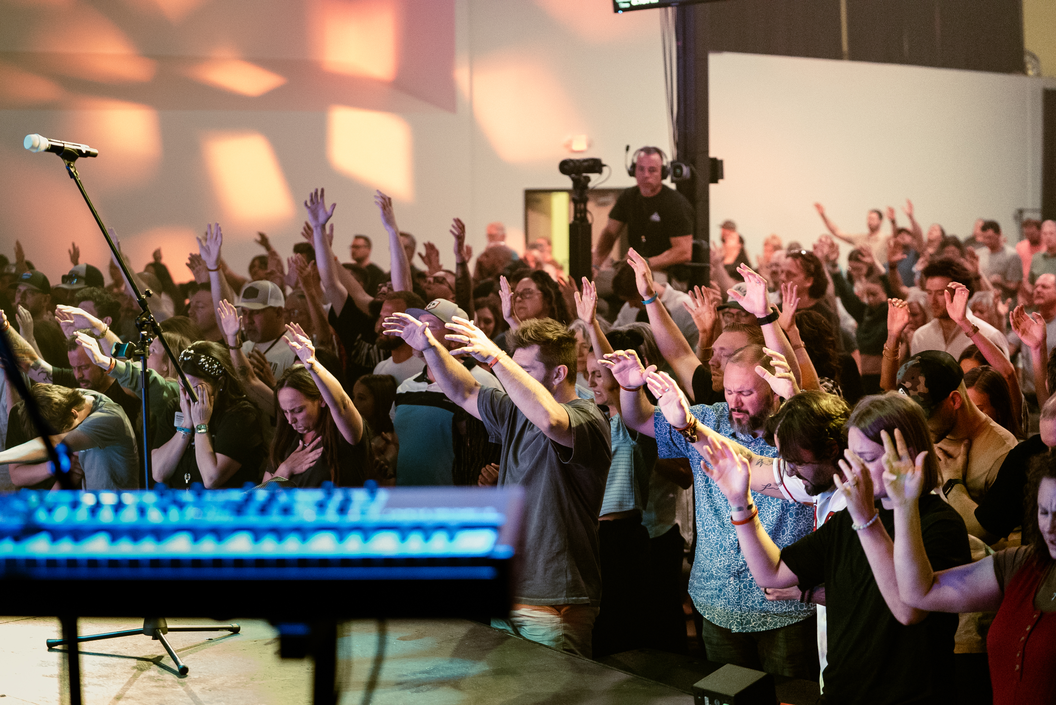 Wide view of the stage from the back of a dark room